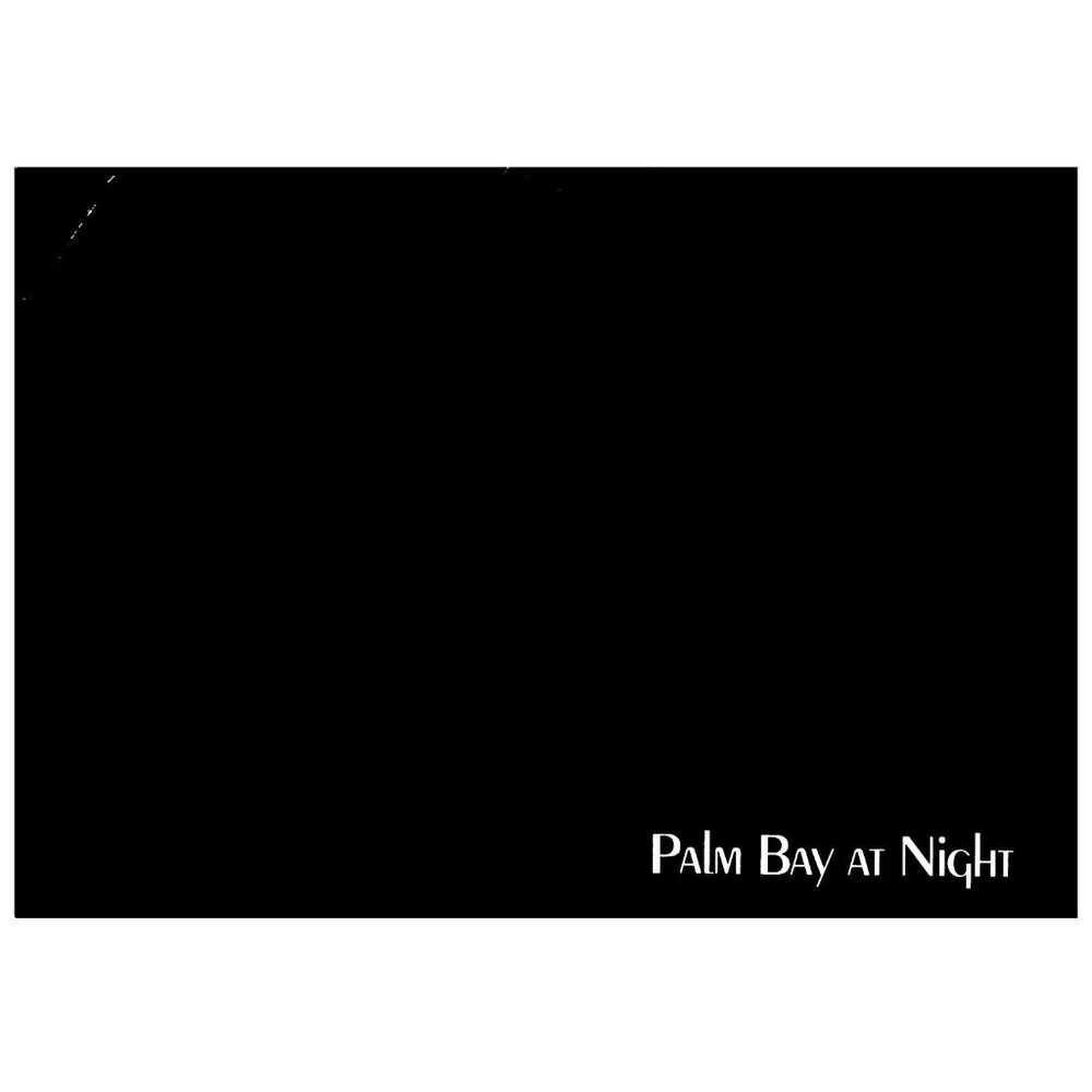 Postcard Palm Bay at Night 1992 Vintage advertising black card front side